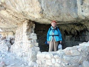 Eileen standing in the mouth of a dolomite cave